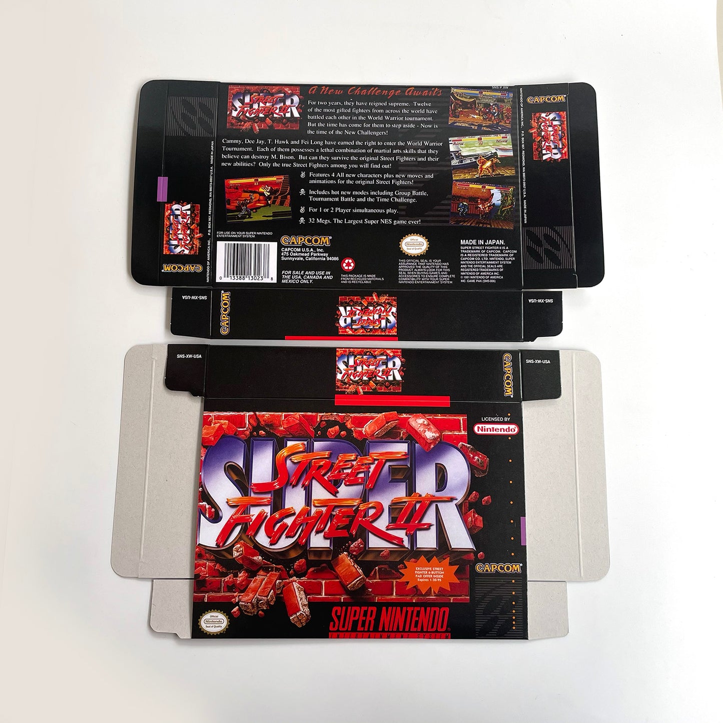 Super Street Fighter II The New Challengers cartridge with tray box manual for SNES super nintendo entertainment system