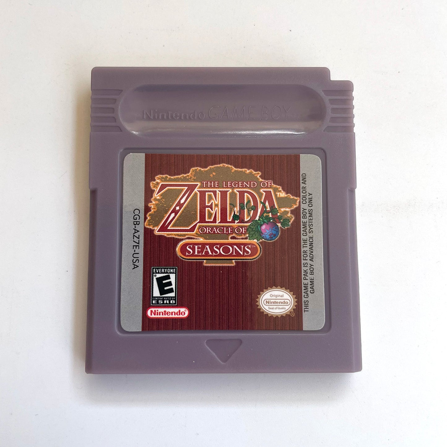 The Legend of Zelda: Oracle of Seasons cartridge with tray box for gbc game boy color