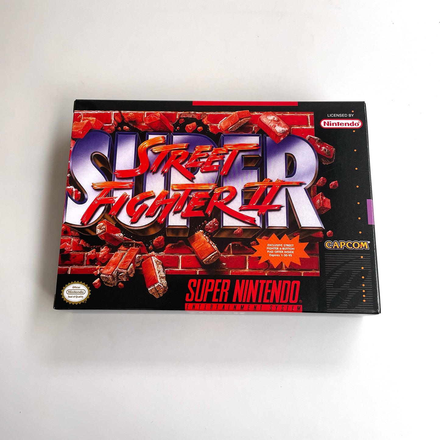 Super Street Fighter II The New Challengers cartridge with tray box manual for SNES super nintendo entertainment system