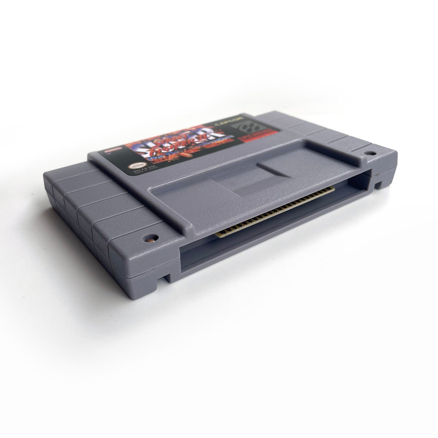 Super Street Fighter II The New Challengers cartridge with tray box manual for SNES super nintendo entertainment system