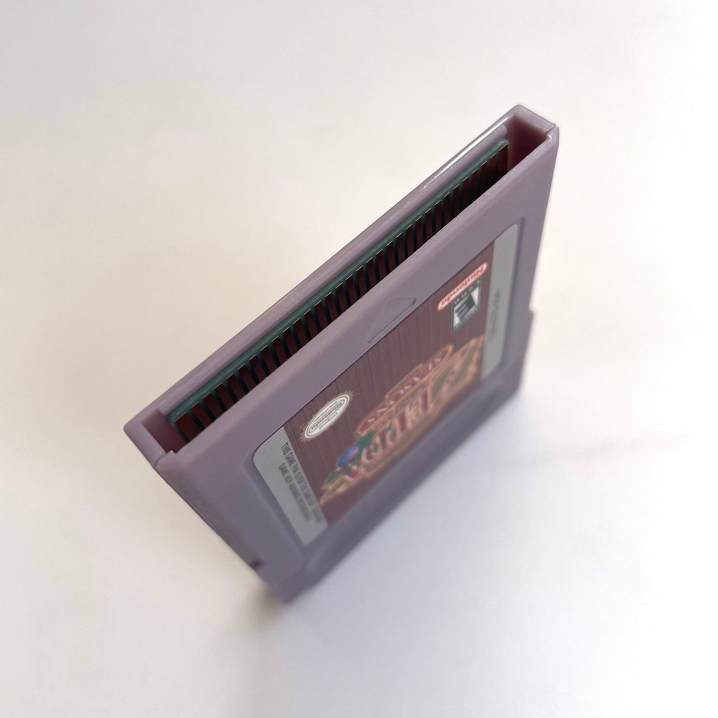 The Legend of Zelda: Oracle of Seasons cartridge with tray box for gbc game boy color