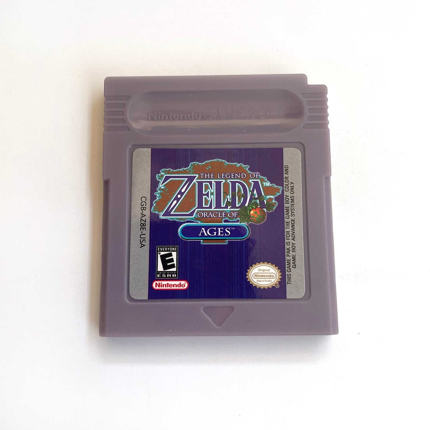 The Legend of Zelda: Oracle of Ages cartridge with tray box for gbc game boy color
