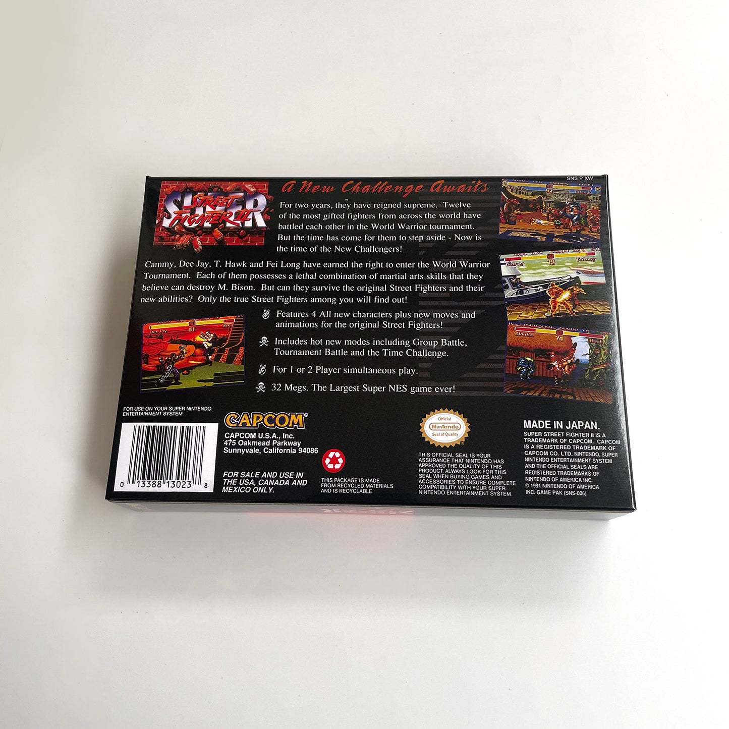 Super Street Fighter II The New Challengers cartridge with tray box manual for SNES super nintendo entertainment system