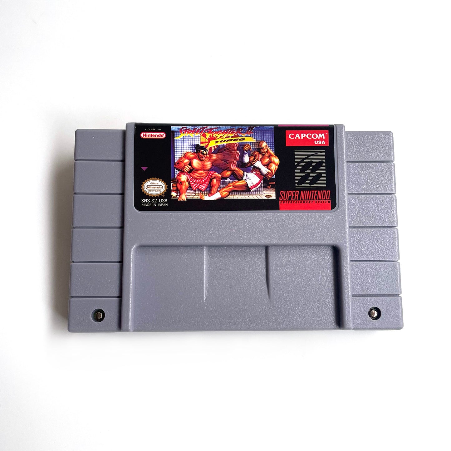 Street Fighter II Turbo cartridge with tray box manual for SNES super nintendo entertainment system